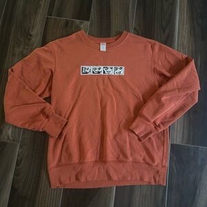 Uniqlo x Keith Haring x Mickey Mouse orange sweatshirt